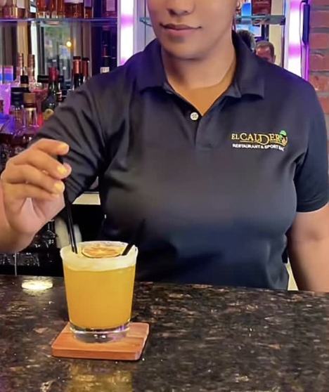 Bartender serving a drink