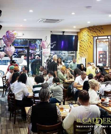 Full dining room on a celebration night